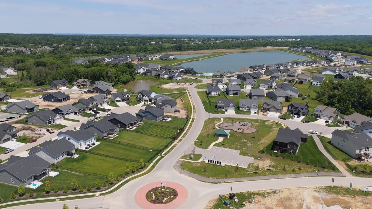 Aerial drone view of Cottleville Trails neighborhood with lakes
