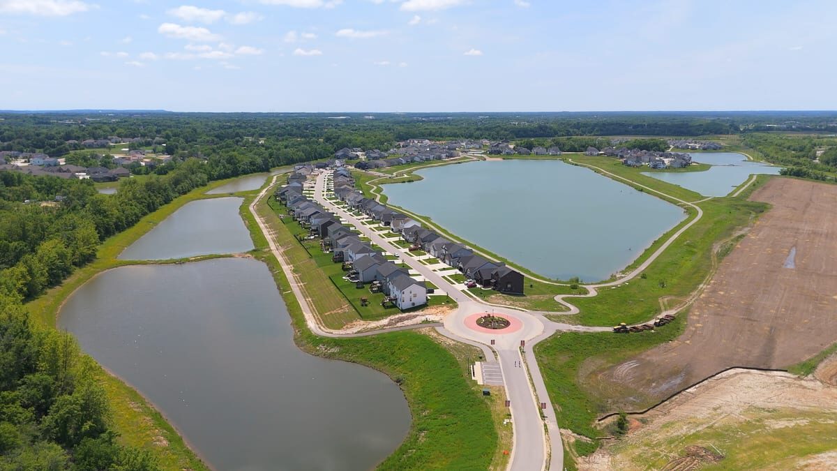 Aerial view of Cottleville Trails homes, lakes, and roundabout